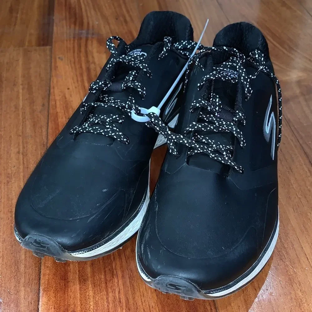 Skechers women’s Black Athletic Golf cleats Sneakers with White Accents size 7.5